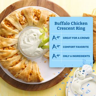A photo of a buffalo crescent ring with a report card that gives the recipe an A+. The Pillsbury Doughboy is jumping for joy in the bottom right corner.