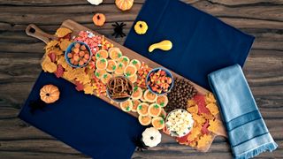 A charcuterie board filled with Halloween-themed Pillsbury products, called a 'charbooterie' board as a pun